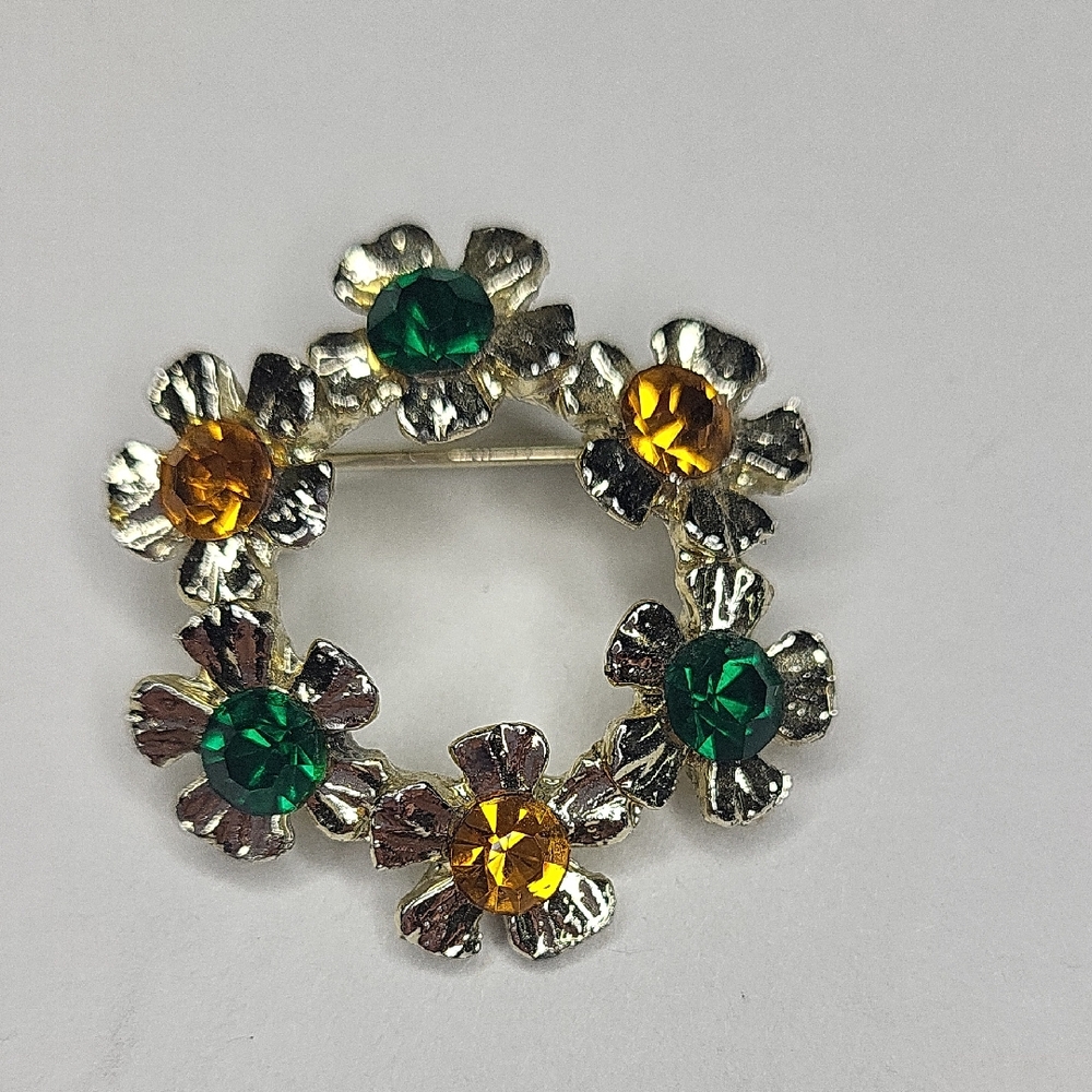 Floral Brooch with Green and Orange Accents